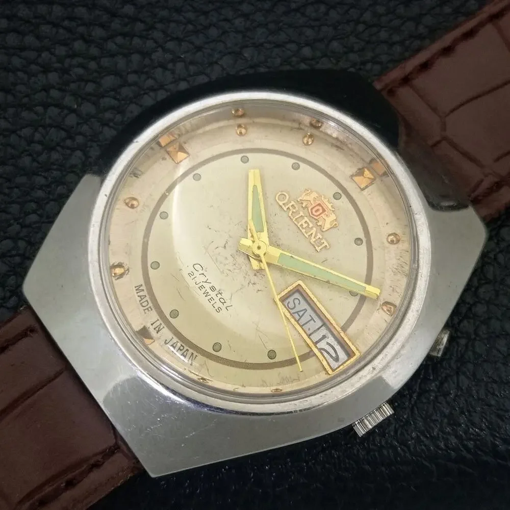 Vintage 1979 Orient Automatic Mens Silver Watch W/daydate & Gold accents